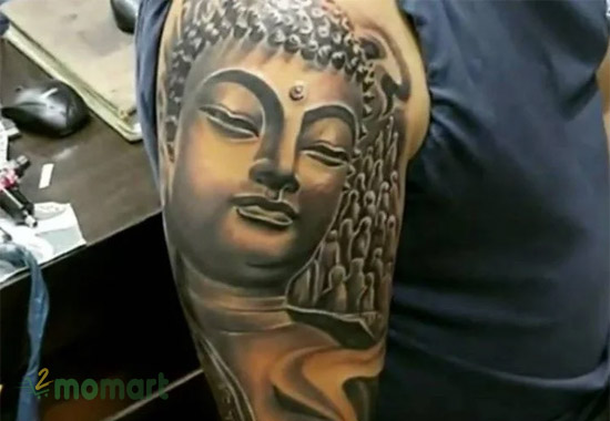 Hình xăm Phật bắp tay đẹp và ấn tượng