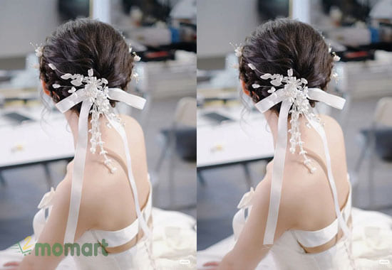 Kiểu tóc cô dâu búi thấp kết hợp cùng vòng hoa nhỏ